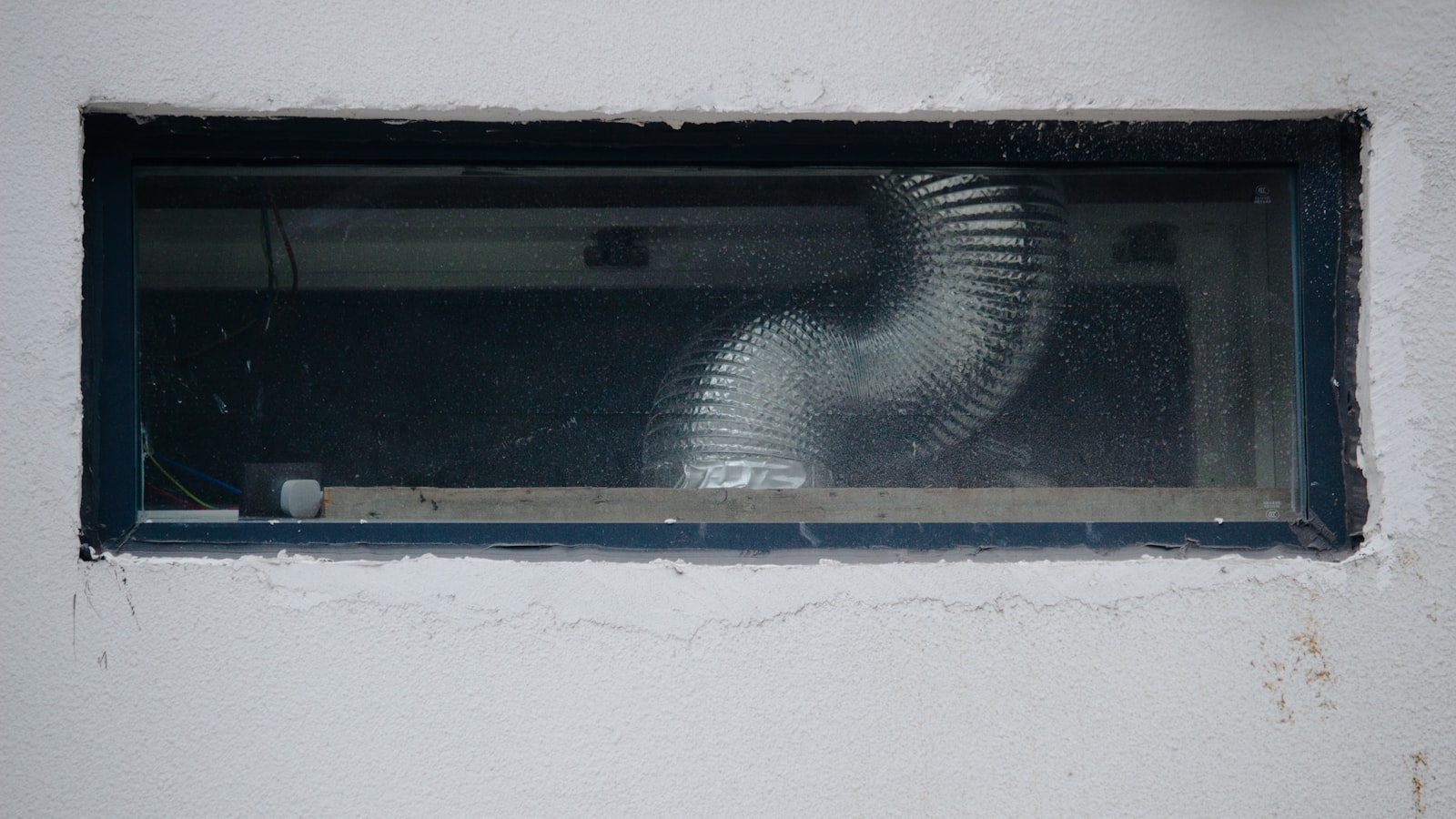Flexible ventilation duct being cleaned