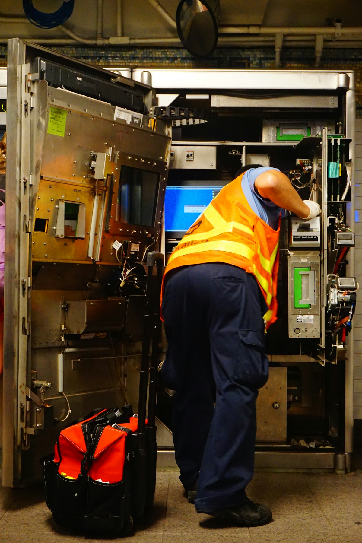 Technician servicing an HVAC unit